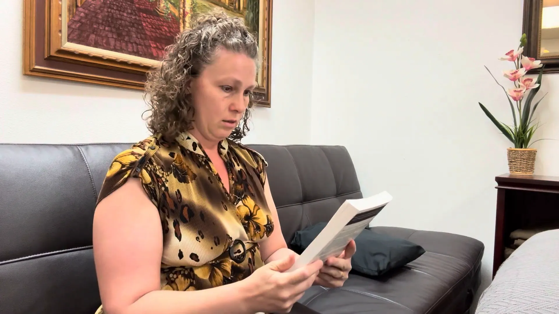 Typical forward head posture while looking down at a book